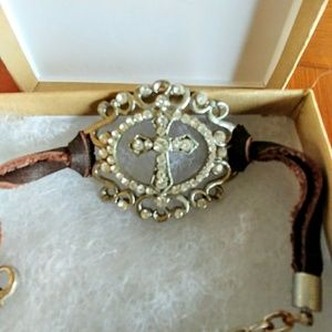 Leather banded cross bracelet